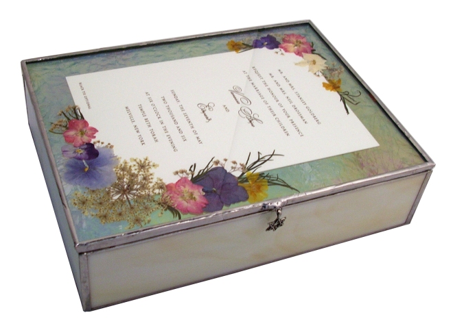 pressed flowers on wedding invitation box